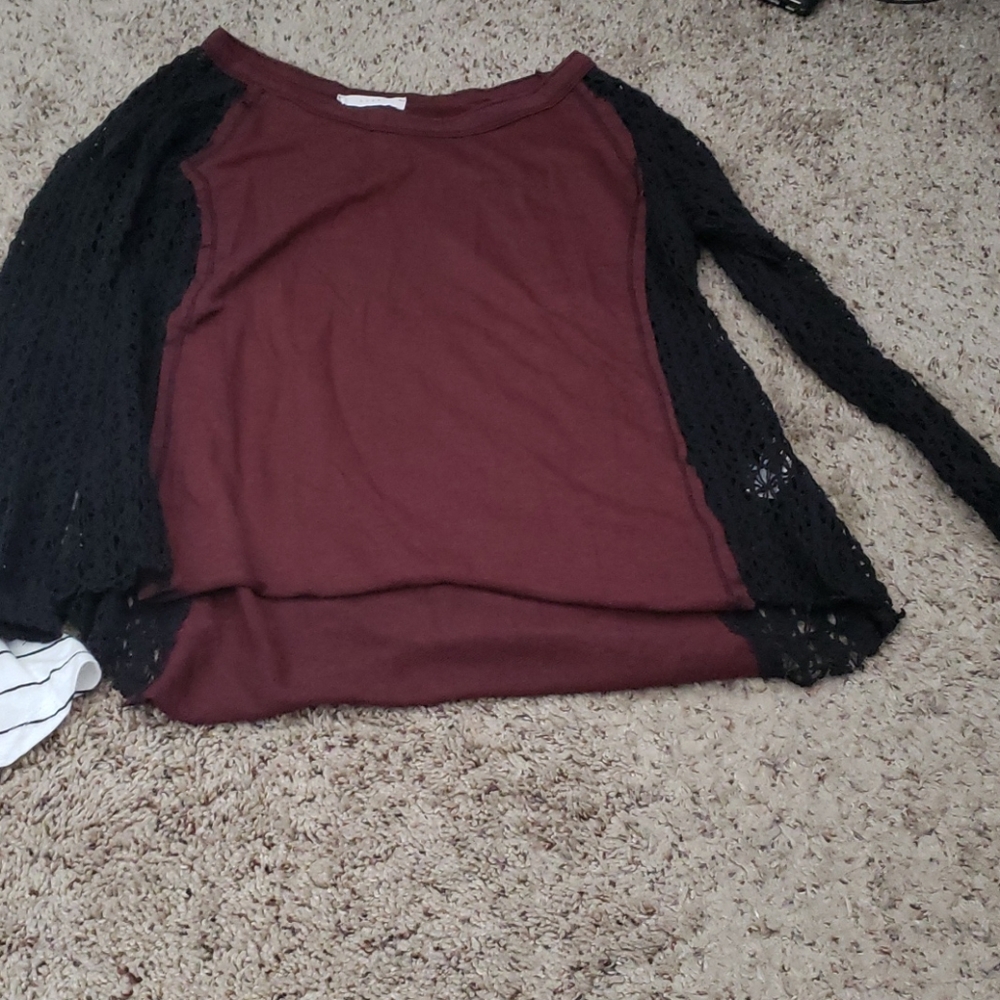2 shirts, one long sleeve one t shirt. Dressier